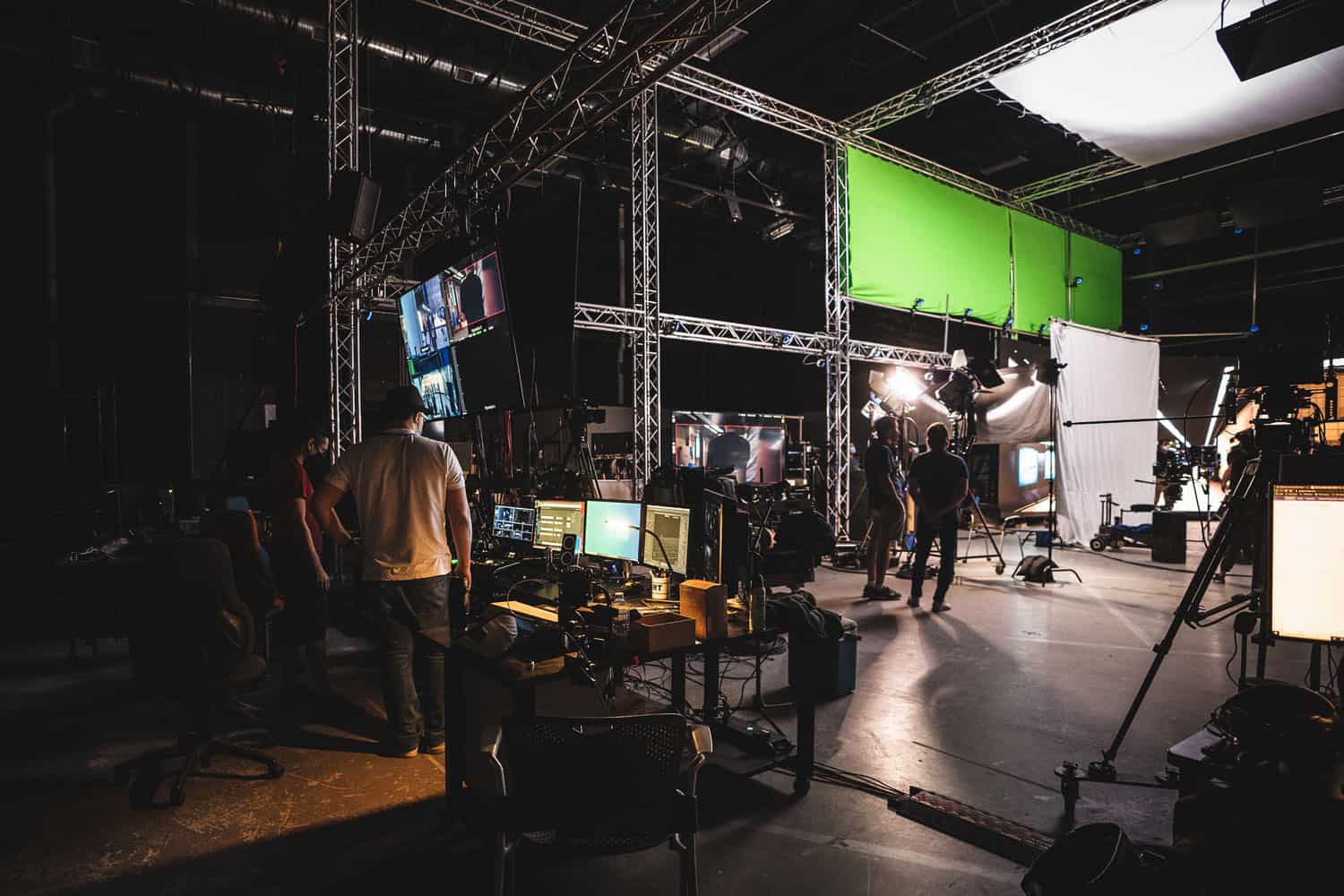 Virtual Production Filming with LED Screens and Green Screens Computers